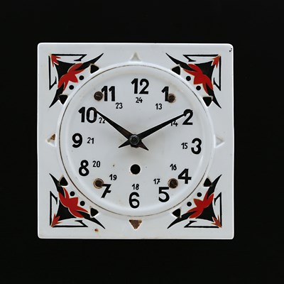 Lot 900 - A Ceramic Wall Clock