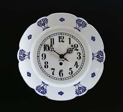 Lot 902 - A Ceramic Wall Clock