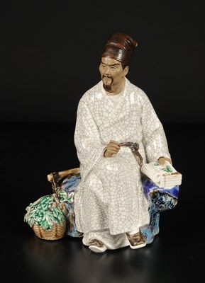 Lot 225 - Chinees Shiwan Figuur van een Geleerde