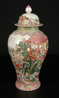 Lot 1157 - A Chinese "Playful Boys" Famille-Rose Relief-Molded Vase with Cover