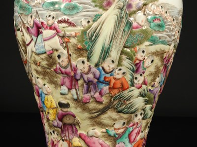 Lot 1157 - A Chinese "Playful Boys" Famille-Rose Relief-Molded Vase with Cover