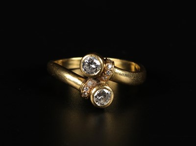 Lot 8 - 18K Gold Diamond Twist Ring