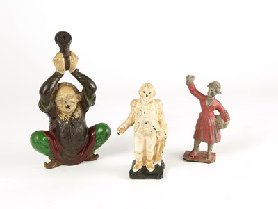 Lot 1155 - Three sculptures, including a door knocker