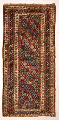 Lot 1286 - An oriental hand-knotted carpet runner