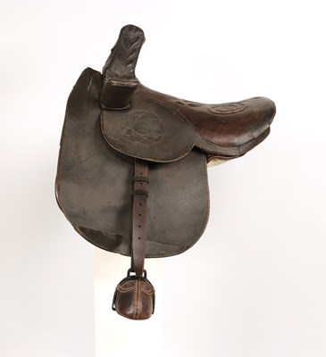 Lot 516 - Leather side saddle lady, with metal and leather stirrups