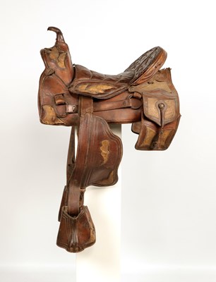 Lot 522 - Antique high back Cuban saddle, with stirrups and saddle bags