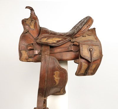 Lot 522 - Antique high back Cuban saddle, with stirrups and saddle bags