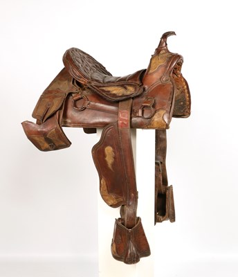 Lot 522 - Antique high back Cuban saddle, with stirrups and saddle bags