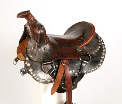 Lot 523 - Leather Childrens Western saddle, with stirrups and decorated with studs