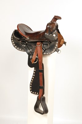 Lot 523 - Leather Childrens Western saddle, with stirrups and decorated with studs