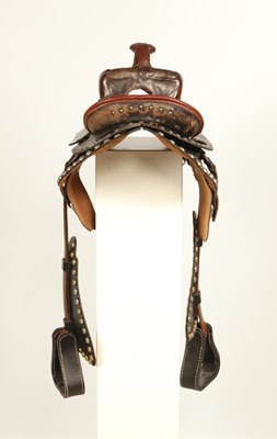 Lot 523 - Leather Childrens Western saddle, with stirrups and decorated with studs