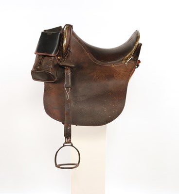 Lot 589 - Military leather saddle, with stirrups and saddlebags