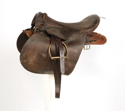 Lot 593 - Dutch cavalry leather saddle, with stirrups