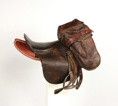 Lot 596 - Military leather horse saddle, with stirrups and saddlebags