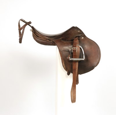 Lot 597 - Military leather horse saddle, with stirrups