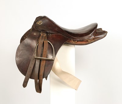 Lot 618 - Leather police saddle, with stirrups