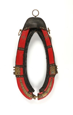 Lot 620 - Red antique leather and wood horse collar harness, with brass mountings