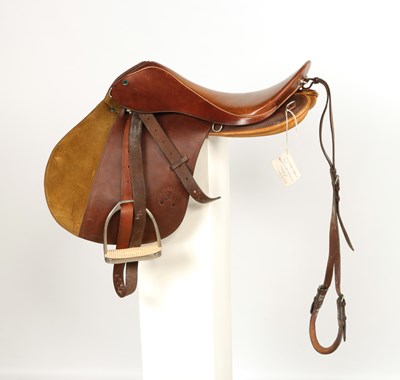 Lot 713 - Leather all purpose horse saddle, with metal stirrups