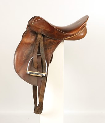 Lot 715 - Leather dressage horse saddle, with metal stirrups