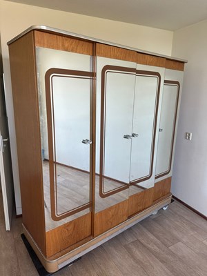 Lot 246 - A 1970's Macassar Projection Wardrobe