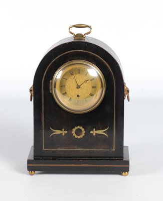 Lot 1141 - A wooden table clock with a brass dial