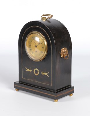 Lot 1141 - A wooden table clock with a brass dial