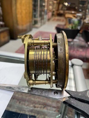 Lot 1141 - A wooden table clock with a brass dial