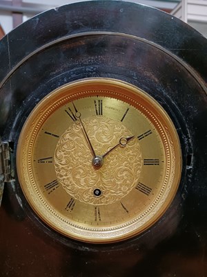 Lot 1141 - A wooden table clock with a brass dial