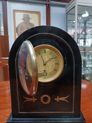 Lot 1141 - A wooden table clock with a brass dial