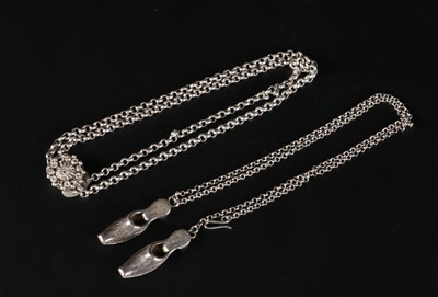 Lot 22 - Two Silver Chains, one with small engraved slippers.