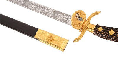 Lot 104 - A ROYAL GILT PRESENTATION HUNTING HANGER